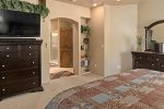 The bedroom leads to an en-suite bathroom